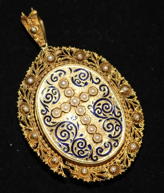 A Victorian gold, enamel and split pearl set filigree pendant with glazed back, (a.f.) 2in excluding bale.